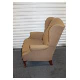 Elegant Wingback Armchair with Patterned Upholstery