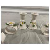Four Ceramic Napkin Rings and Two Candlesticks