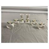 Four Ceramic Napkin Rings and Two Candlesticks