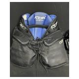 Goalie Gear inc. Helmet (does not inc cert stickers for competition use), HPG RBK JR-L Breezers, and Mesh Bag of Accesories