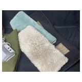 Variety of Bathmats, Wicker Trash Bin, Electric Duster, Power Strip, Large Green Throw (fleece/felt), Small White Trash Bin