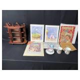 Lot of Great Britain/Royal Family Themed Collectibles, Coronation Coloring Book, Tea Cup and Saucer Set, 2 Park Scene Heirloom China Mugs and Small Wooden Display Case w/ Glass Door