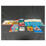 7 Disney Disposable Tablecloths, Elmo Happy Birthday Banner, Sticker Book, Disney Sketch Pad, Tonka Coloring Book, "Always in Trouble" Scholastic Book