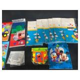 7 Disney Disposable Tablecloths, Elmo Happy Birthday Banner, Sticker Book, Disney Sketch Pad, Tonka Coloring Book, "Always in Trouble" Scholastic Book