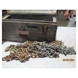 Metal toolbox containing misc chain...