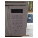 Whirlpool above the cabinet mountin...