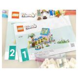 Large Lot of Legos Friends and Creator Sets, Manuals, Minifigures, etc.