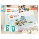 Large Lot of Legos Friends and Creator Sets, Manuals, Minifigures, etc.