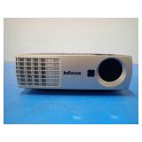 InFocus IN1102 Projector with travel case // 1280 x 800 Native resolution with 2200 ANSI Lumens // Flickering once in awhile, lamp is on its way out // Includes power and display cables