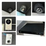 Security System: 2 Axis white box cameras, 3 black alarm.com dome cameras, as well as Alarm.com CSVR2008 SVR