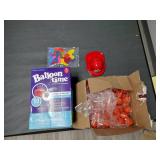 Mini basketballs, balloons, helium kit, and plastic fire fighter helmets