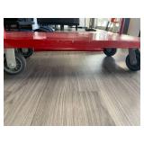 Adjustable panel flatbed dolly