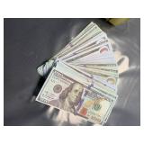 Fire Power money gun with fake $100 bills
