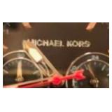 Nike shoes and Micheal Kors watch