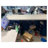 Corian Desk, Front counter, filing cabinet built in, 3 orange chairs, one barstool