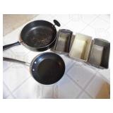 2 frying pans plus 6 metal loaf pan...