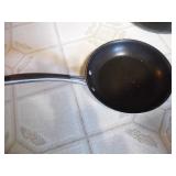 2 frying pans plus 6 metal loaf pan...