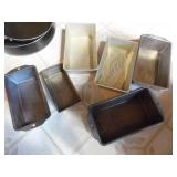 2 frying pans plus 6 metal loaf pan...
