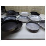 variety of metal baking pans includ...