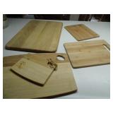 5 various sized cutting boards...