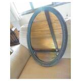 27"x19" oval framed wall mirror...