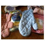 box of kitchen linens, towels, wash...