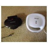 2 sandwich grills 1 sm, 1 lg...