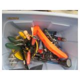 Storage tote containing hand held g...