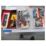 Small metal toolbox with a variety ...