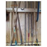 Lot of assorted garden hoes and wee...