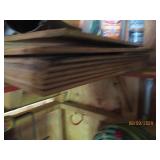 Short stack of 18"×24" plywood sec...