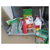 Shelf filled with lawn care product...
