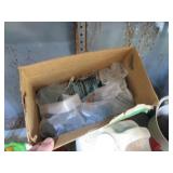 Shelf filled with lawn care product...