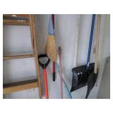 Corner lot of mops, step ladder, rakes & more