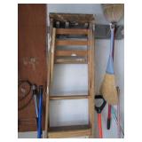 Corner lot of mops, step ladder, rakes & more