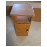 End table measures 13" wide 27" tal...