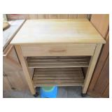 Wood shelf on caster wheels top is ...