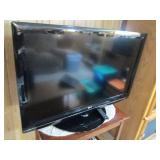 LG 42" flat screen TV with remote, ...