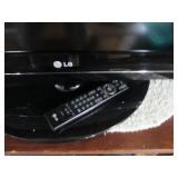 LG 42" flat screen TV with remote, ...