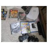 PS3 game system with assorted games...