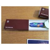 2 New Victorinox knives, sticker an...