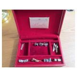 Vintage box containing rings, tie c...