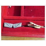 Vintage box containing rings, tie c...