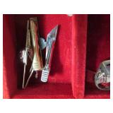 Vintage box containing rings, tie c...