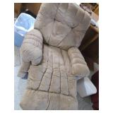 Plush and comfy tan recliner...