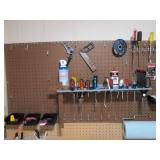Assorted tools and peg board hooks...