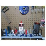 Assorted tools and peg board hooks...