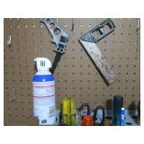 Assorted tools and peg board hooks...