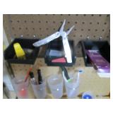 Assorted tools and peg board hooks...