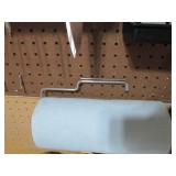 Assorted tools and peg board hooks...